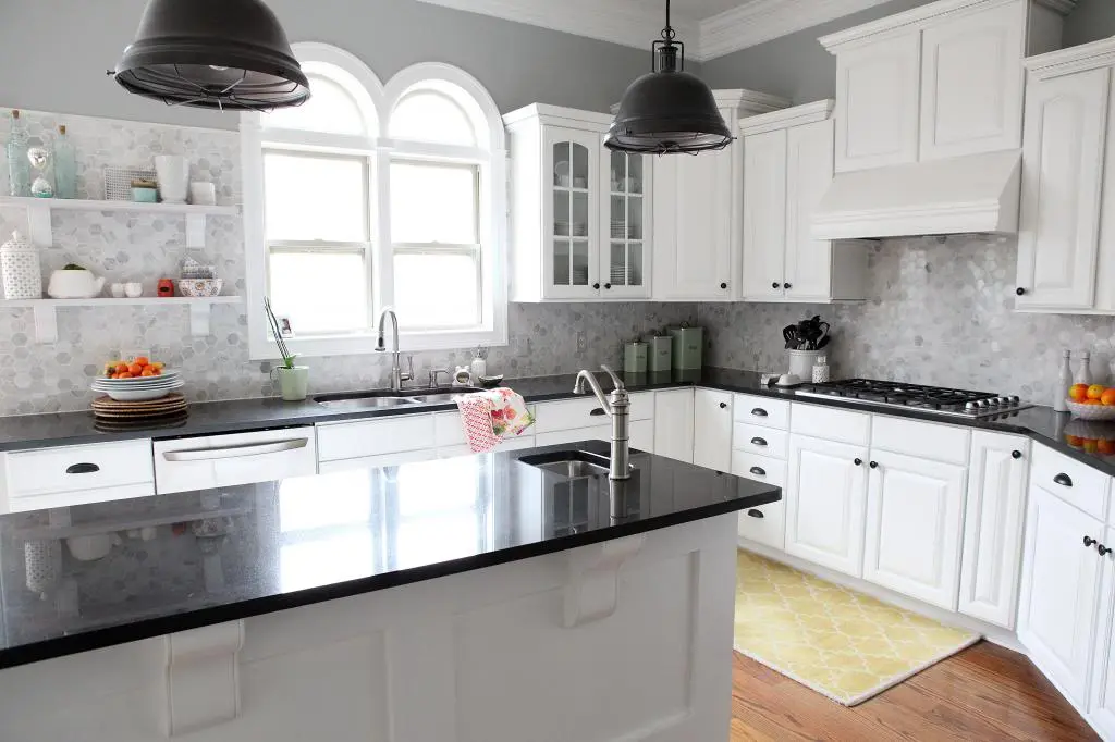 Black Granite with Crisp White Cabinetry